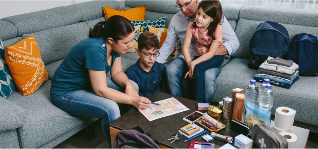 Family around a coffee table